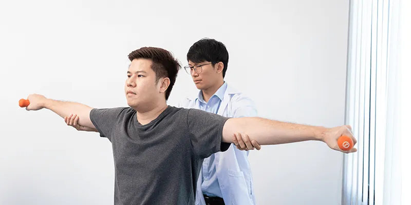 doctor checking patient arms